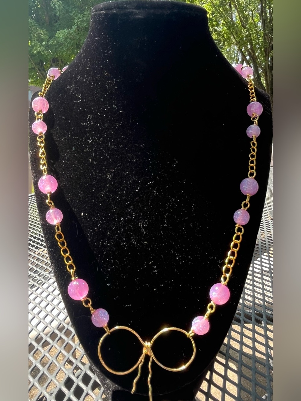 Hand Crafted Gold Necklace with lavender Beads and asymmetrical bow Pendant